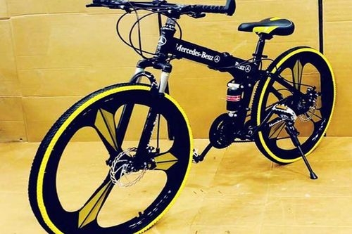 Black and Yellow Mercedes Benz Foldable Cycle V/S Triban 100 Flat Bar Road Bike